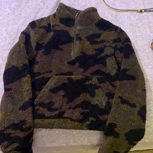 a large camouflage long sleeve sweater from aero.